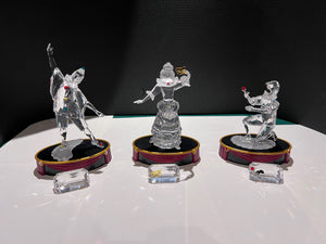 Swarovski Crystal ‘Masquerade’ Trilogy: Pierrot, Columbine and Harlequin, 1999-2001 (includes stands & plaques)