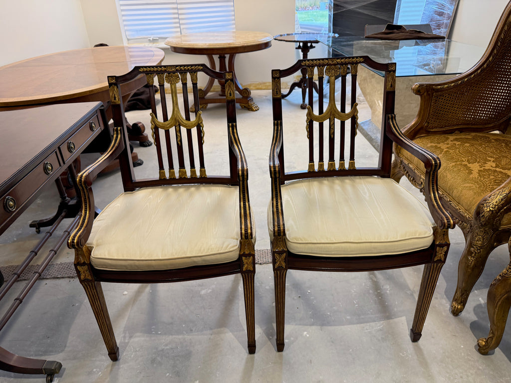 pair of Maitland Smith parcel gilt mahogany and swag shield back cane seat armchairs