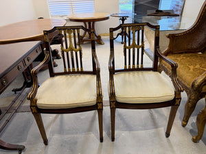 pair of Maitland Smith parcel gilt mahogany and swag shield back cane seat armchairs
