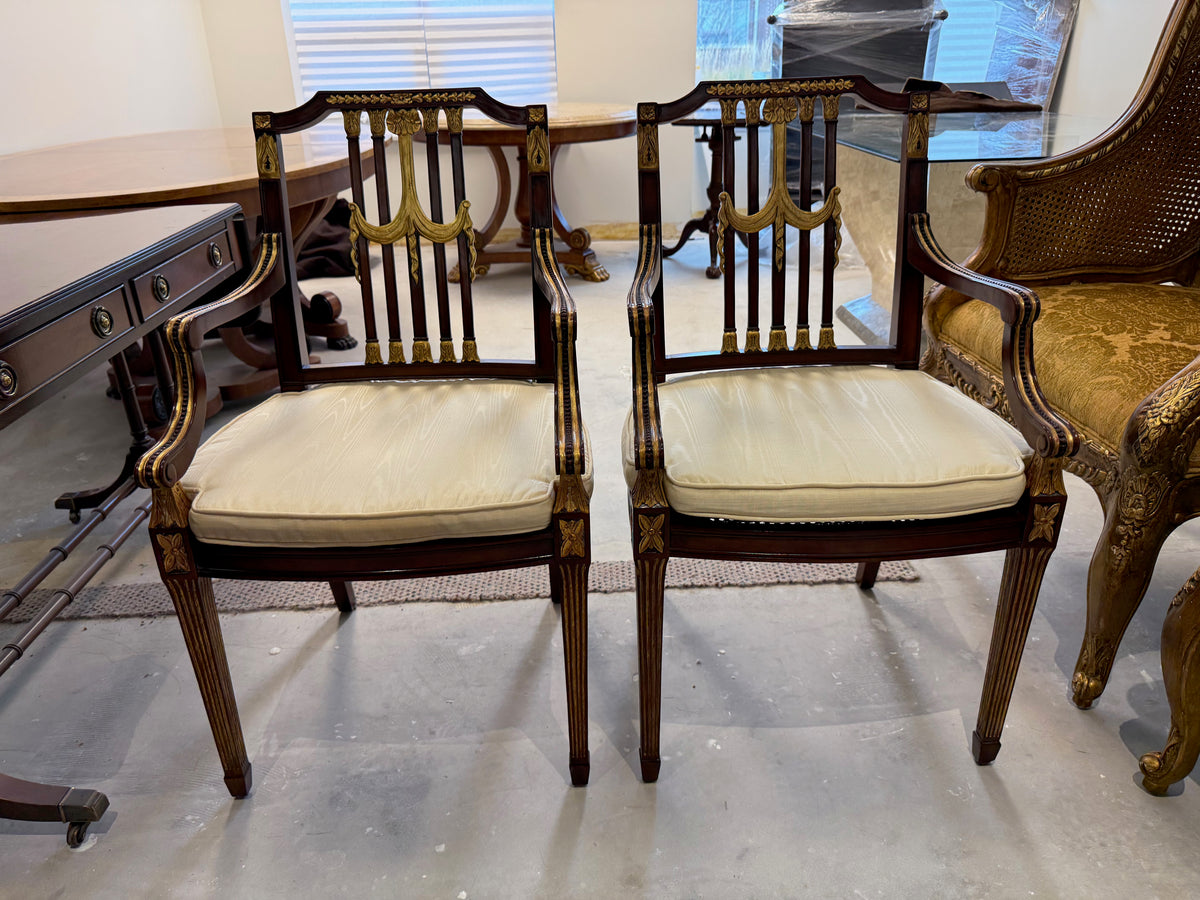 pair of Maitland Smith parcel gilt mahogany and swag shield back cane seat armchairs