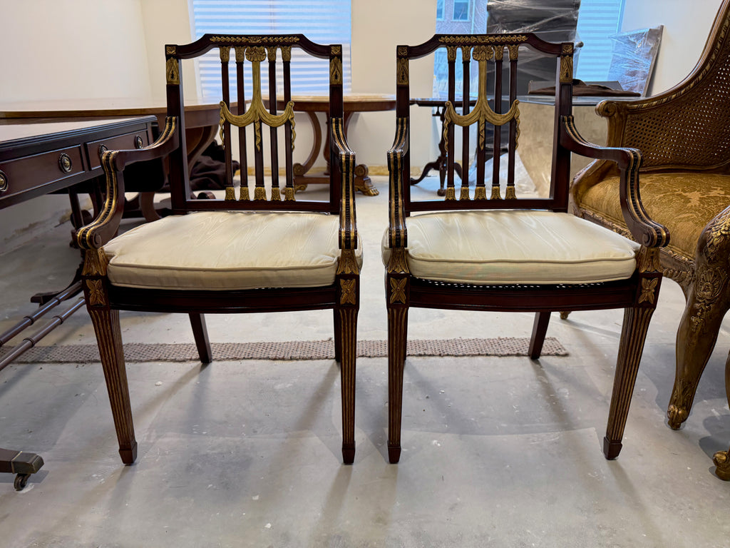 pair of Maitland Smith parcel gilt mahogany and swag shield back cane seat armchairs