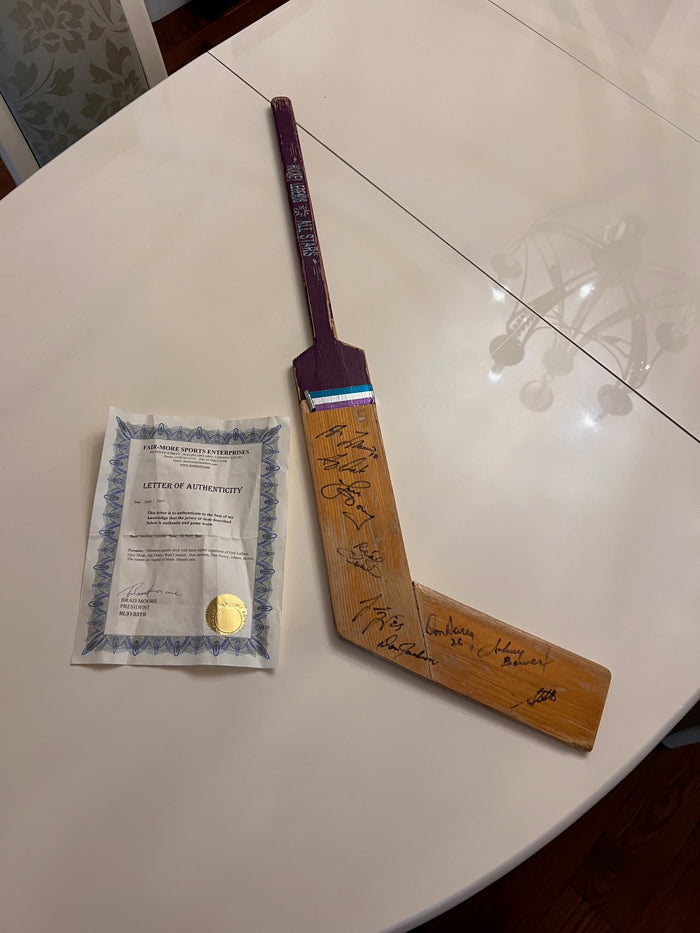 Miniature Goalie Stick Signed by; Guy Lafleur, Gary Doak, Jim Dorey, Real Cloutier, Don Jackson, Don Awrey, Johnny Bower (with COA)