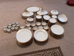 VIGNAUD LIMOGES 'The Seville" pattern with gilt and blue laurel border Lot