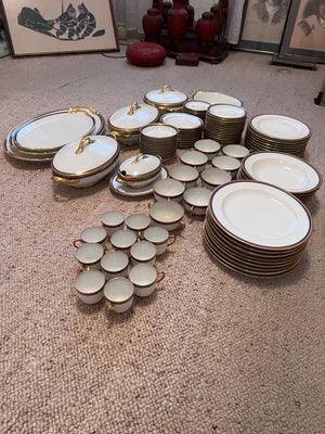 VIGNAUD LIMOGES 'The Seville" pattern with gilt and blue laurel border Lot