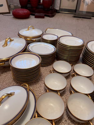 VIGNAUD LIMOGES 'The Seville" pattern with gilt and blue laurel border Lot