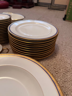 VIGNAUD LIMOGES 'The Seville" pattern with gilt and blue laurel border Lot