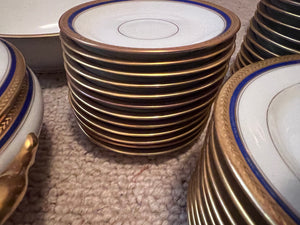 VIGNAUD LIMOGES 'The Seville" pattern with gilt and blue laurel border Lot