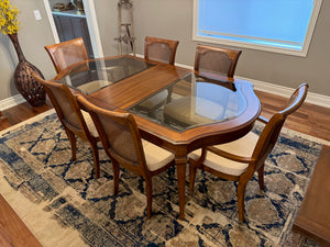 Dining table with 8 chairs (1 leaf inserted)