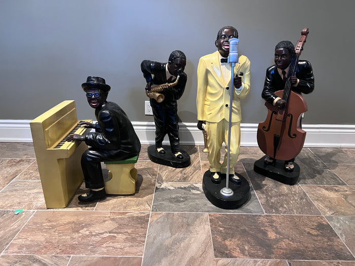 VERY UNIQUE! A Group of 4 Large Composite Jazz Band Statues