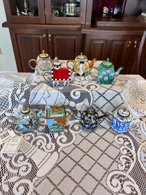 8 Miniature Kelvin Chen Enamelled Teapots