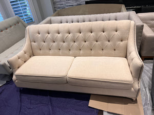 Beige Upholstered Tufted Sofa
