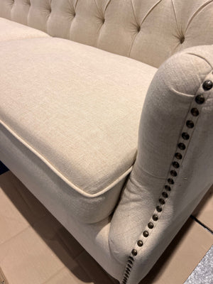 Beige Upholstered Tufted Sofa