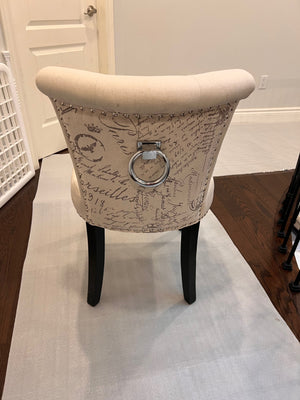 2 Beige Chairs w/Design on Back