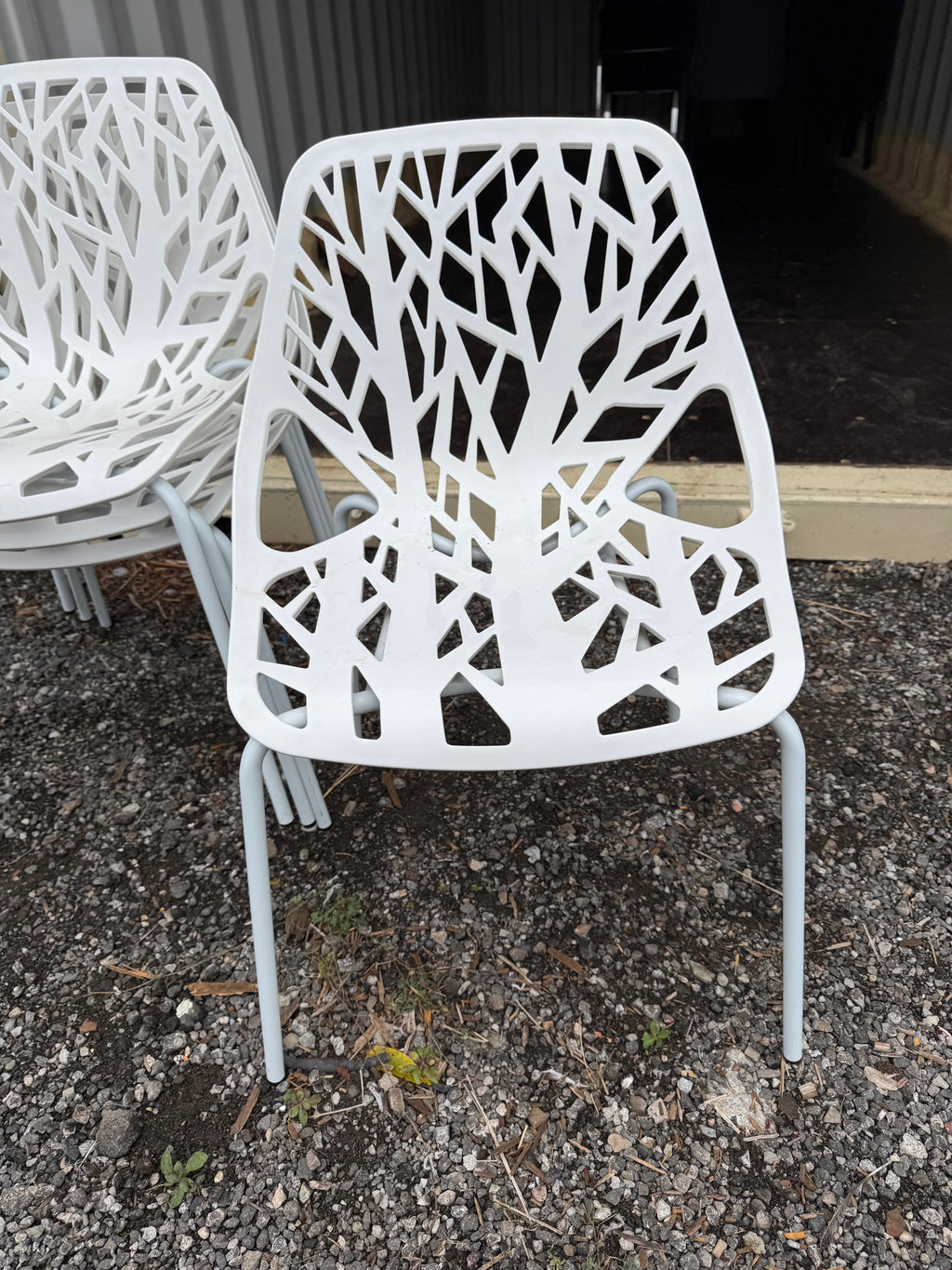 Set of 4 White Plastic Stackable Chairs