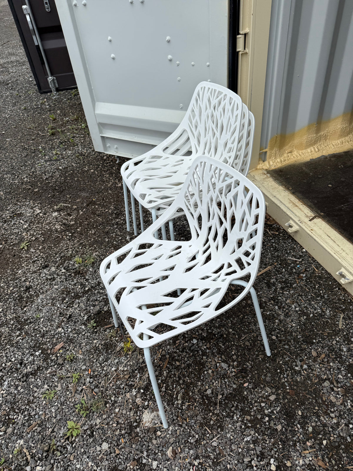 Set of 4 White Plastic Stackable Chairs