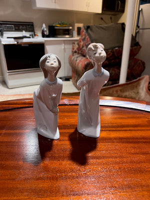 Lladro 'Boy & Girl Kissing'- 4873, 4869