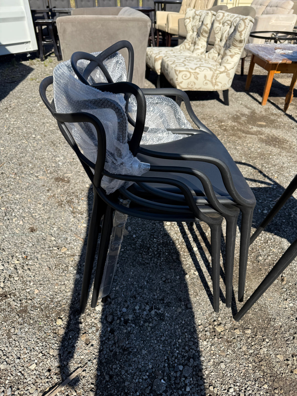 Set of 4 Black Plastic Masters Chairs
