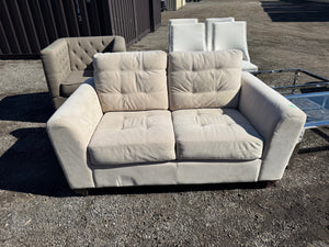 Beige Upholstered Love Seat