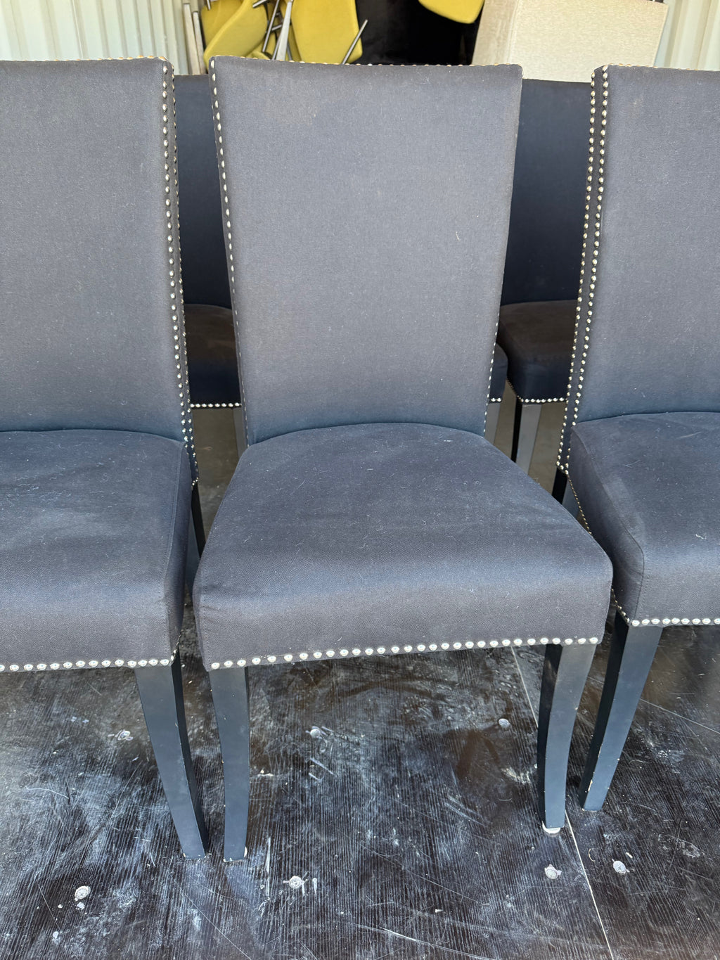 Set of 8 Black Fabric Dining Chairs with Studded Trim