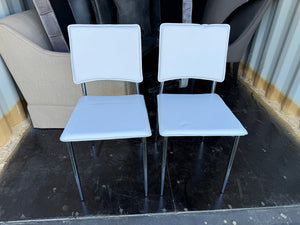 Pair of White Faux Leather Chairs