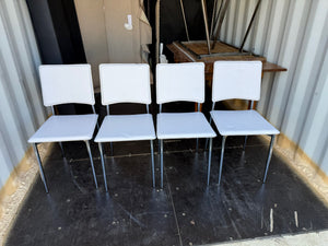 Set of 4 White Faux Leather Chairs