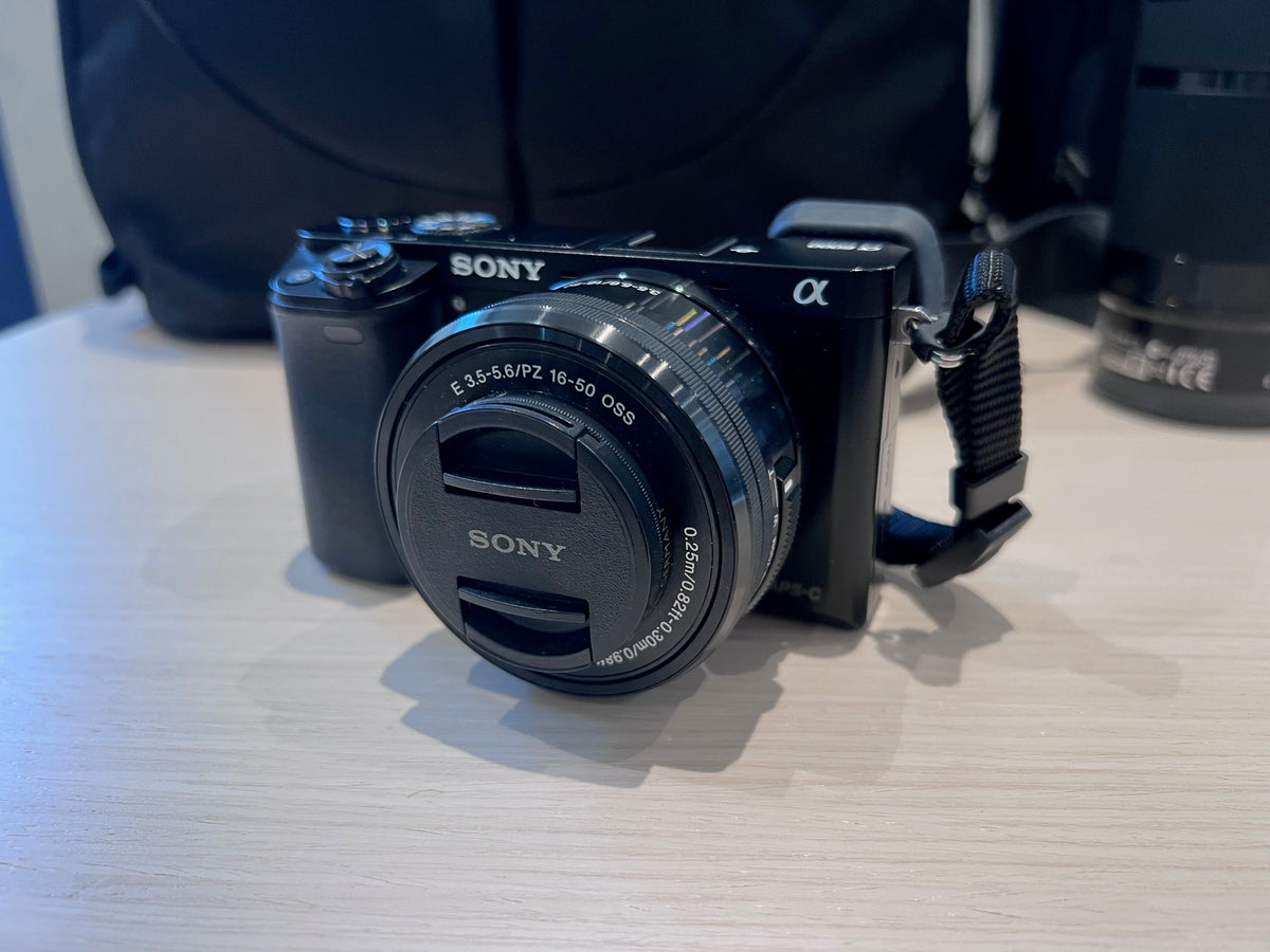 Lot- Sony Alpha a6000 Mirrorless Digital Camera with 16-50mm, Plus 55-210mm Power Zoom Lens, Plus Bag & 2 Carrying Cases