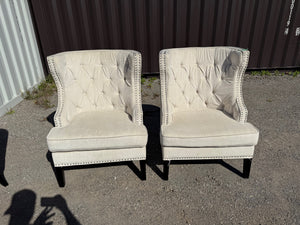 Pair of Beige Tufted Wingback Chairs