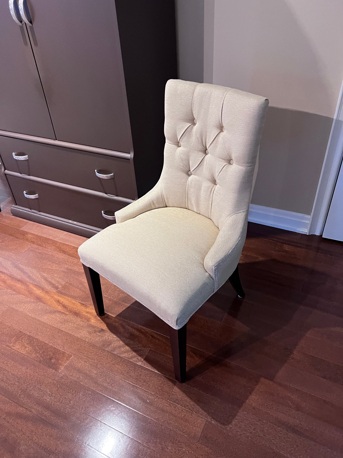 Pair of Beige Tufted Accent Chairs