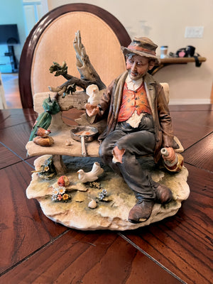 Capodimonte 'Hobo on a bench with birds'
