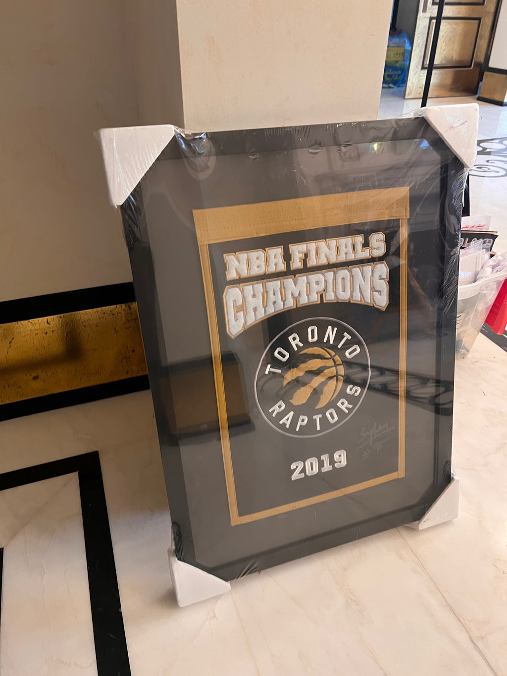Toronto Raptors 2019 NBA Finals Champions Framed Banner Signed by Nav Bhatia SuperFan