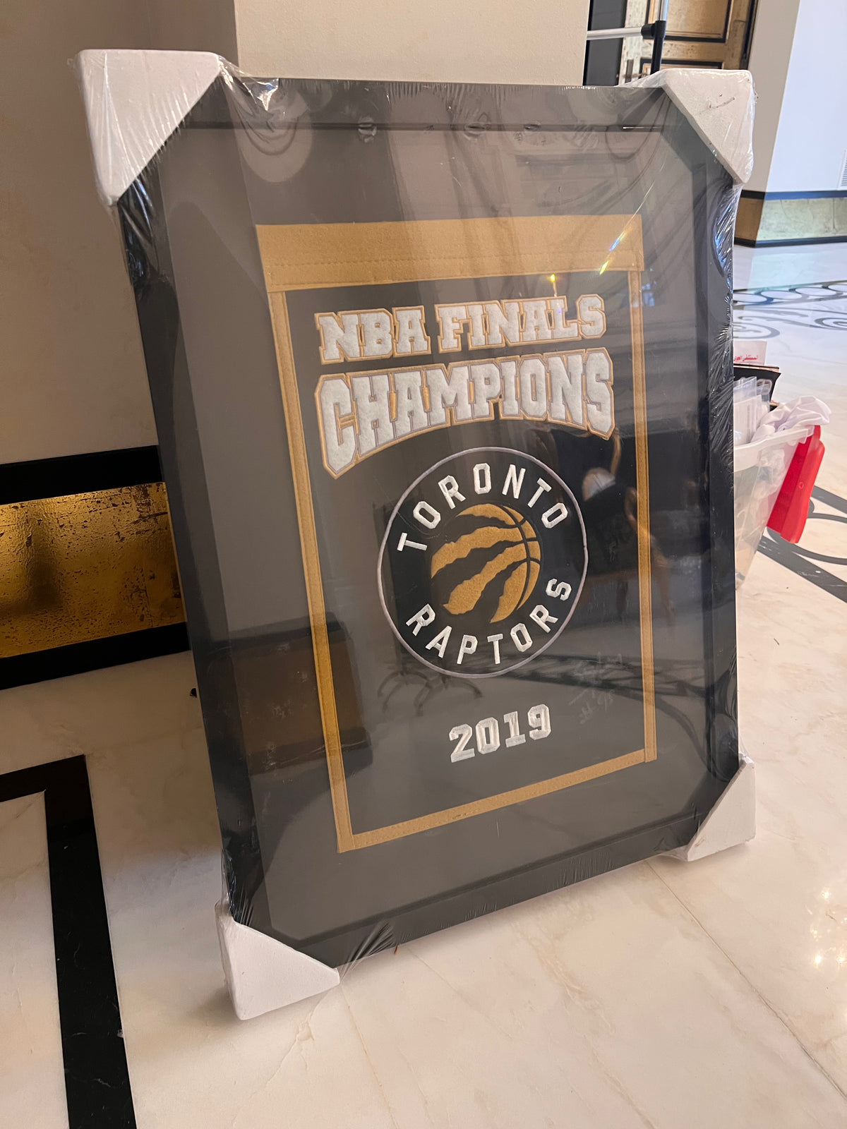 Toronto Raptors 2019 NBA Finals Champions Framed Banner Signed by Nav Bhatia SuperFan