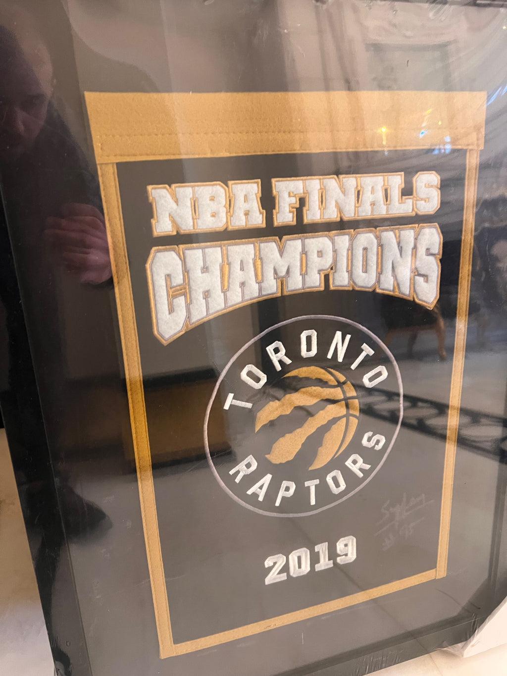 Toronto Raptors 2019 NBA Finals Champions Framed Banner Signed by Nav Bhatia SuperFan