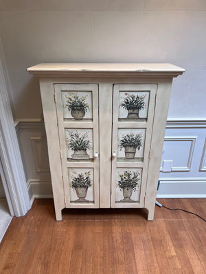 Off White Cabinet with Plant Design
