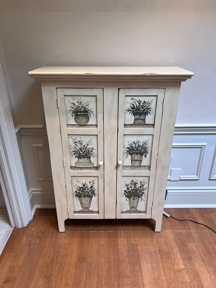 Off White Cabinet with Plant Design