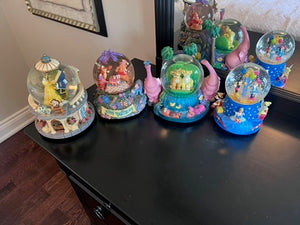 4 Disney Snow Globes