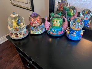 4 Disney Snow Globes