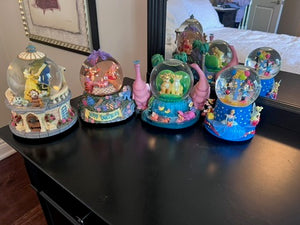 4 Disney Snow Globes