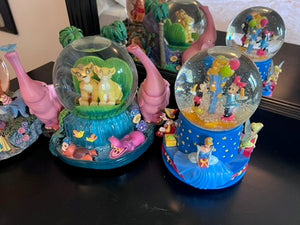 4 Disney Snow Globes