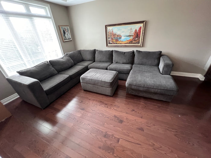 Grey Upholstered Sectional Sofa + Storage Ottoman