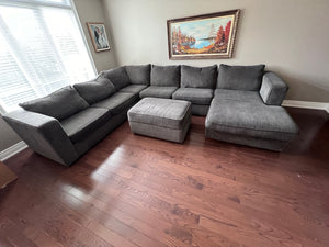 Grey Upholstered Sectional Sofa + Storage Ottoman