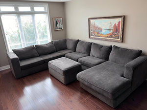 Grey Upholstered Sectional Sofa + Storage Ottoman