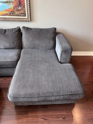 Grey Upholstered Sectional Sofa + Storage Ottoman