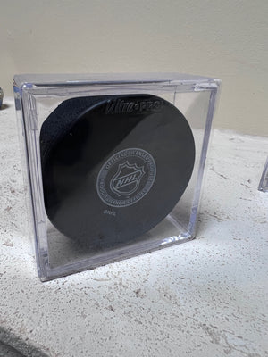 2 Toronto Maple Leafs Pucks Signed by Bobby Baun #21
