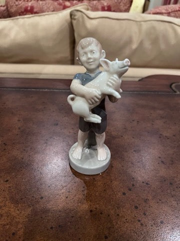 Royal Copenhagen Figurine 'August Boy with Piglet' 4530