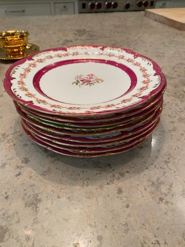 8 Red & Gold Porcelain Side Plates