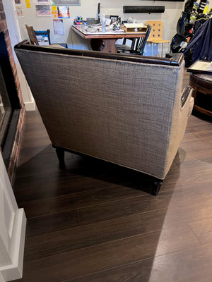Beige Upholstered, Black Frame Oversized Armchair