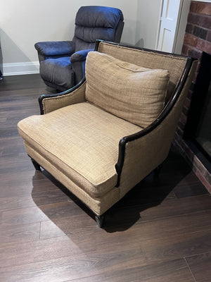 Beige Upholstered, Black Frame Oversized Armchair