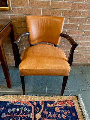 2 Orange Leather Armchairs