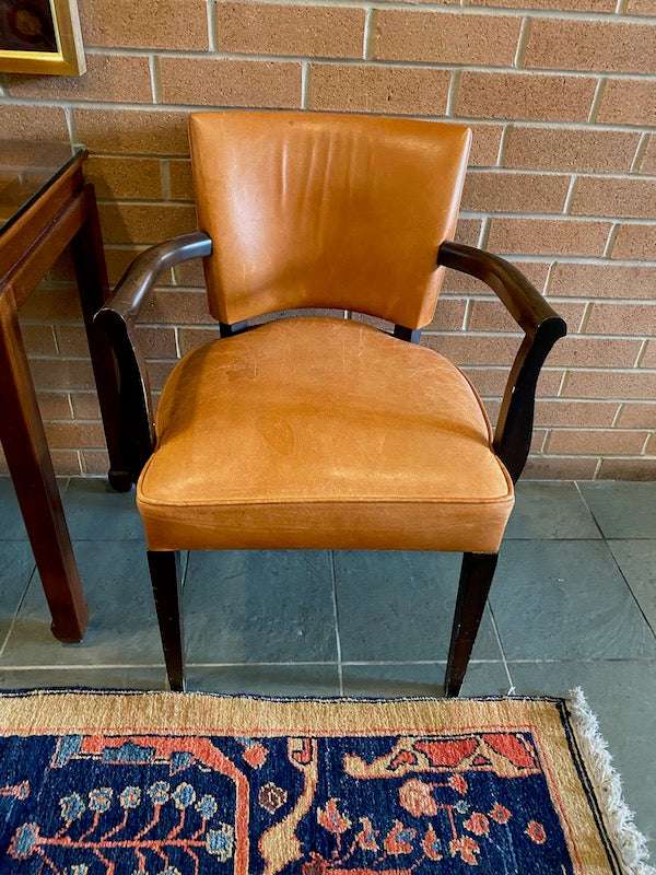 2 Orange Leather Armchairs