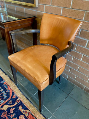 2 Orange Leather Armchairs